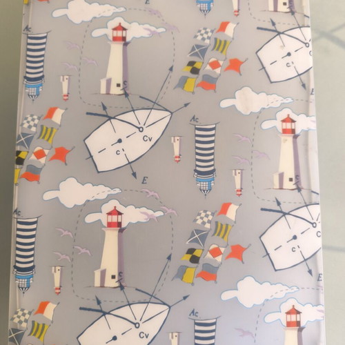 Decorative storage box used with nautical theme, lighthouses and flags