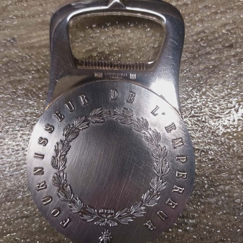 Christofle bottle opener like new, silver plated