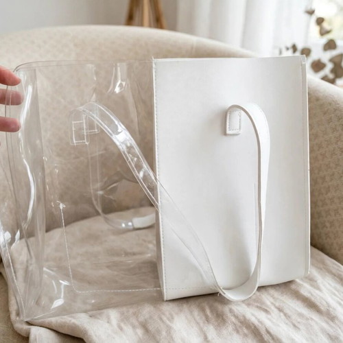 Transparent shoulder bag like new, white with minor stains