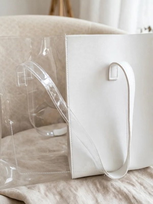 Transparent shoulder bag like new, white with minor stains