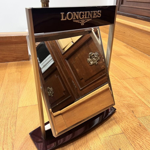 Longines mirror used with minor paint wear, wooden frame