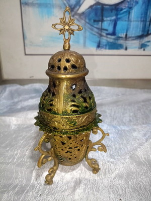 Bronze incense burner with traditional motifs