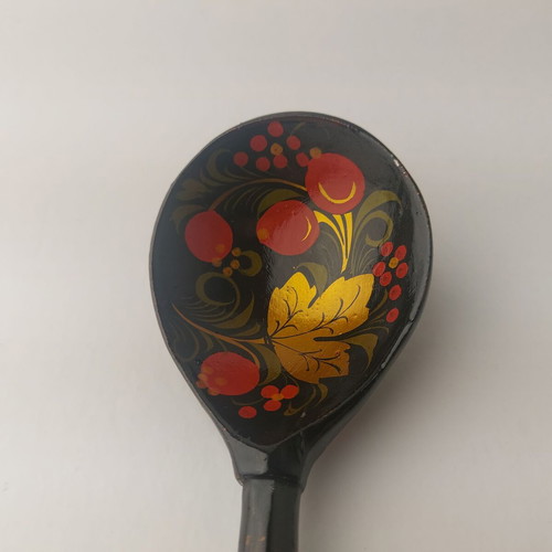 Old painted wooden spoon used