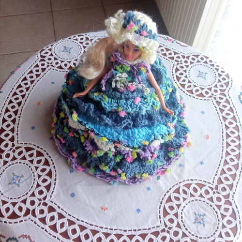Handmade knitted dress and hat set for doll, bathroom decor