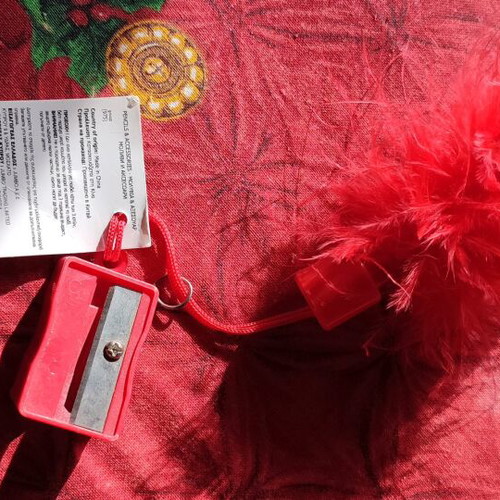 Pencil sharpener with decorative feather new