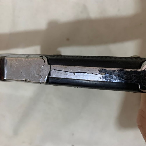 Decorative knife used with sheath and cracked aluminum handle