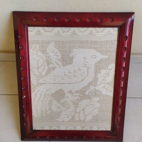 FRAME. THE BIRD IS WOVEN ON THE LOOM IN THE YEAR 1950