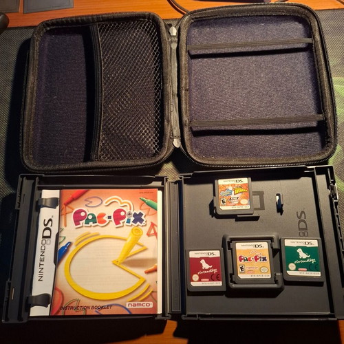 Nintendo 2DS used with 4 games, case and charger