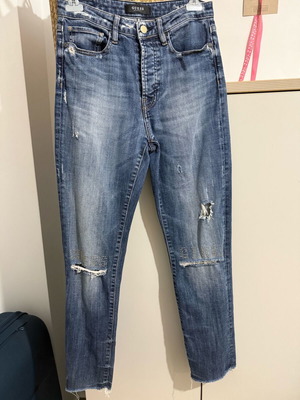 Guess jeans used with knee rips, size L