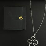 Necklace with metal and rhinestone pendant