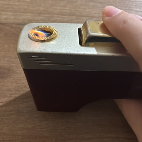 Crown Zeta 5 lighter used with signs of wear