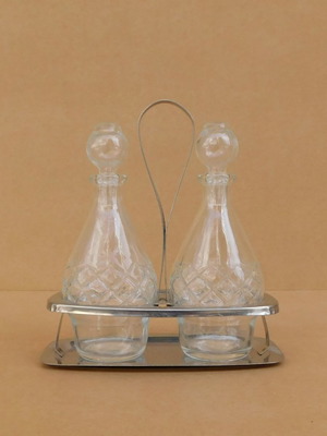 Oil and vinegar set with crystal bottles and nickel-plated base in excellent condition