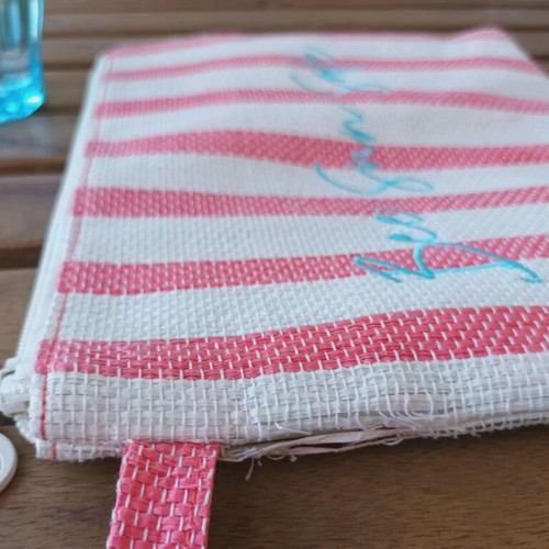 Summer toiletry bag used striped with embroidered Bee Sun Safe phrase