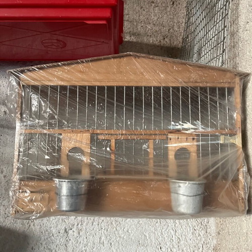 Wooden birdcage used for canaries or small birds