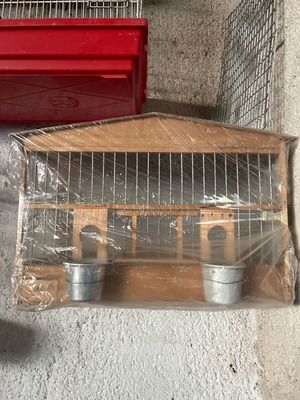 Wooden birdcage used for canaries or small birds