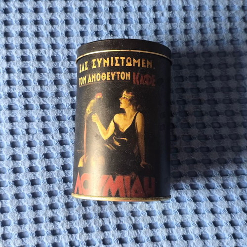 Vintage Loumidis coffee metal tin with pin-up girl