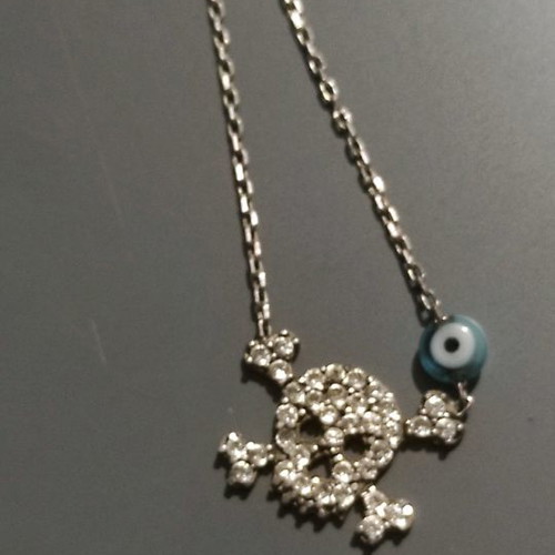 Pendant necklace with thin chain, used with skull and blue eye