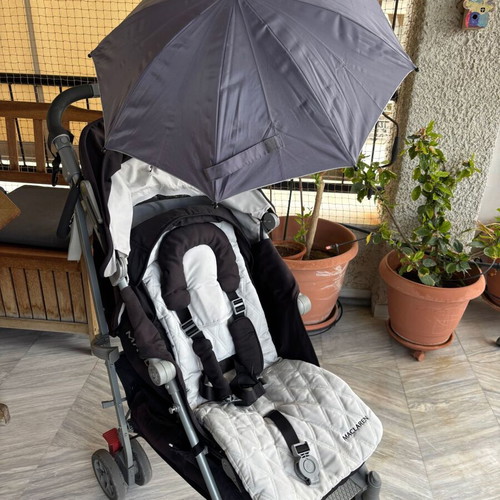 Maclaren Techno XLR stroller used with accessories and carrycot