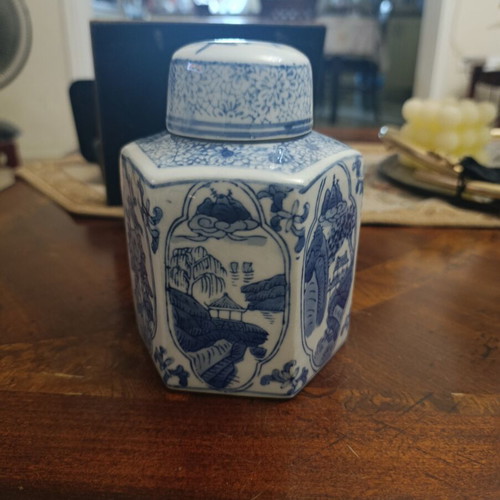 Hexagonal decorative vase with scenes