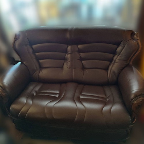 Leather sofa Italian design used, dark brown with wood details