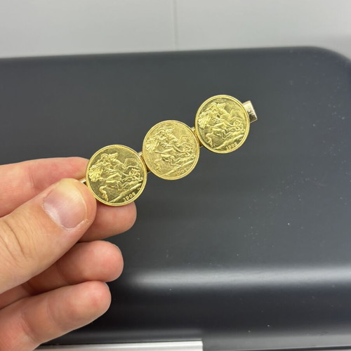 Gold-plated hair clip with 3 English coins used