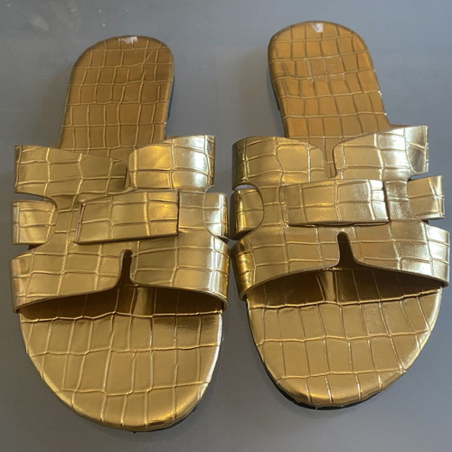 Gold Sandals like new, unique design, size 39