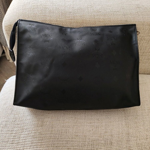 MCM unisex black nylon clutch used with leather interior