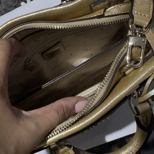 Guess gold shoulder bag with woven front design