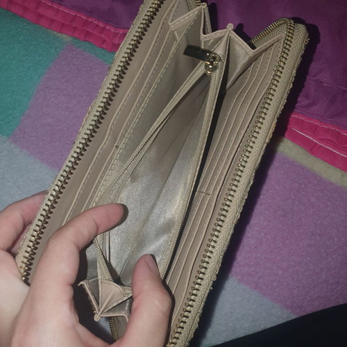 Trussardi beige wallet used with wear