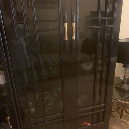 Solid wood showcase used, black lacquer with lighting