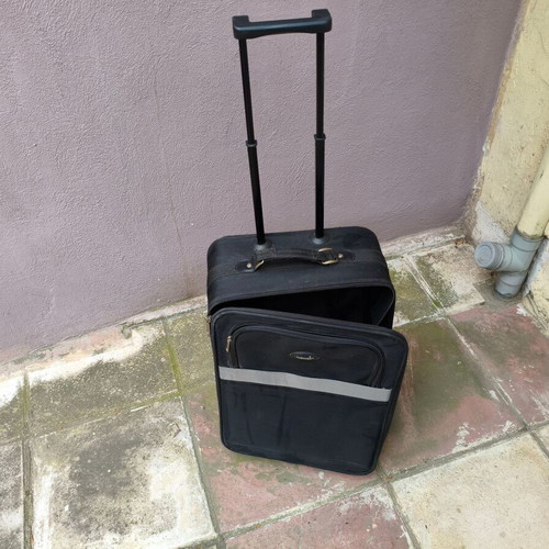 Wheeled suitcase used black
