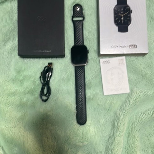 QCY Watch new with charging cable compatible with iOS and Android