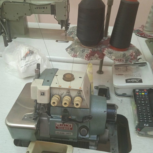 Industrial sewing machines used, including Treasure button machine and cutters
