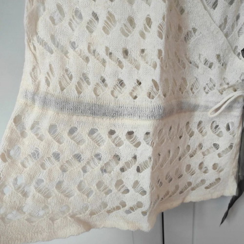 Beige knitted cardigan with openwork pattern and belt like new