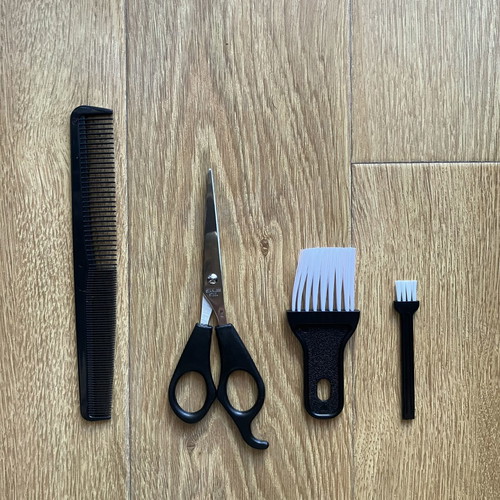 Hair Clipper Accessories like new with comb, scissors, and cleaning brushes