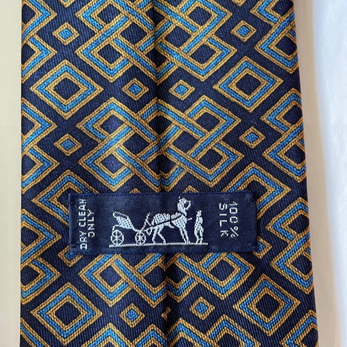 Hermes silk tie new with dark blue background