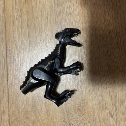 Lego Jurassic World Indoraptor toy with missing tail