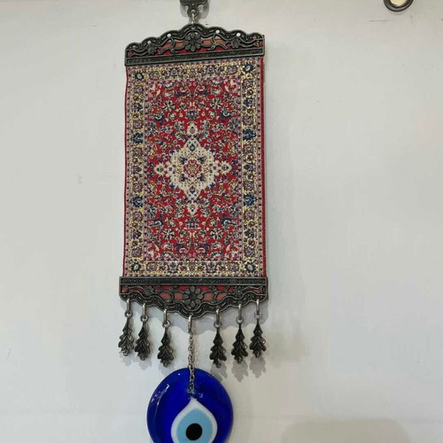 Vintage handmade wall amulet with oriental rug and glass eye 32x10