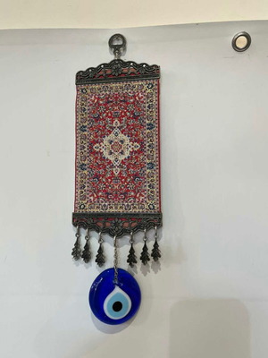 Vintage handmade wall amulet with oriental rug and glass eye 32x10