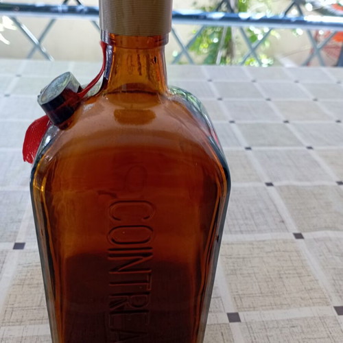 Cointreau collectible bottle, amber