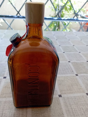 Cointreau collectible bottle, amber