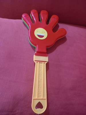 Hand Clapper toy used, plastic noise maker