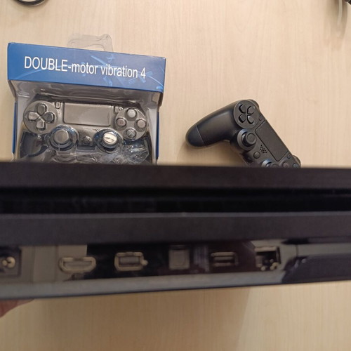 PlayStation 4 Pro 1TB used, complete bundle with 2 controllers