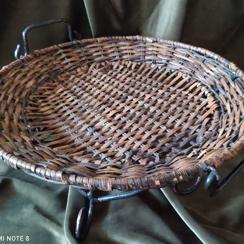 Woven rattan tray used with metal frame