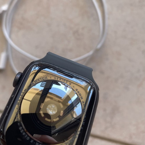 Apple Watch Series 5 44mm with charging cable, straps and screen protectors