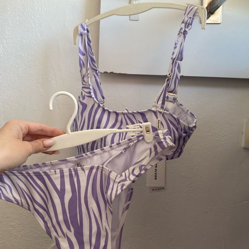 Swimsuit new, white and purple, available sizes 40, 42, 44, 46