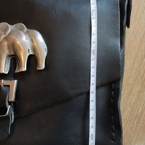 Leather crossbody bag used black with silver elephant buckle