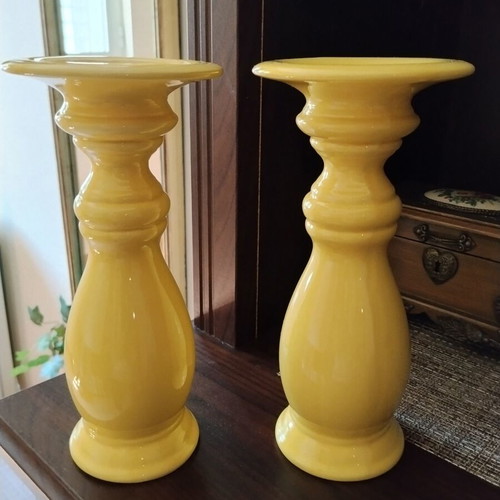 Set of two yellow ceramic candlesticks, 21 cm