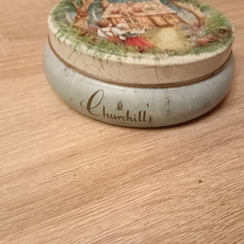 Metal Churchill s candy tin used, vintage with embossed design