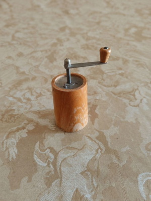 Vintage wooden spice mill used, functional